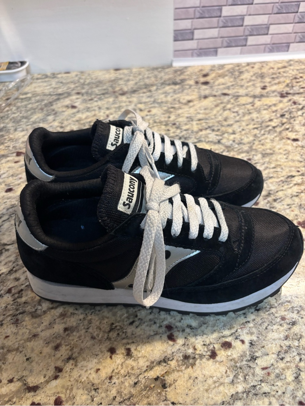 Saucony Black and Silver Retro Runner Sneakers